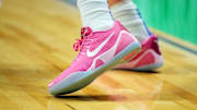 Creighton Bluejays forward Jackson McAndrew wears the Nike Kobe 9 Low "Think Pink" colorway.