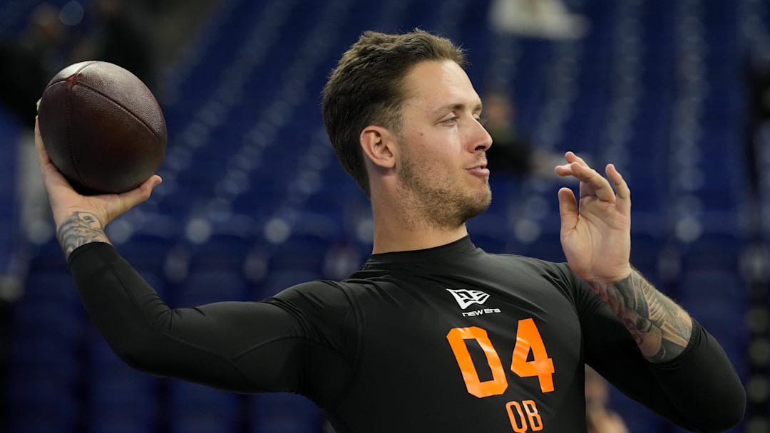 Feb 28, 2026; Indianapolis, IN, USA; Miami quarterback Carson Beck (QB04) during the NFL Scouting Combine at Lucas Oil Stadium. Mandatory Credit: Kirby Lee-Imagn Images