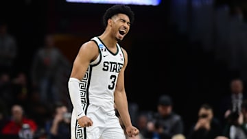 Mar 21, 2025; Cleveland, OH, USA; Michigan State Spartans guard Jaden Akins (3) dunks in the second half against the Bryant University Bulldogs during the NCAA Tournament First Round at Rocket Mortgage Fieldhouse. Mandatory Credit: Ken Blaze-Imagn Images