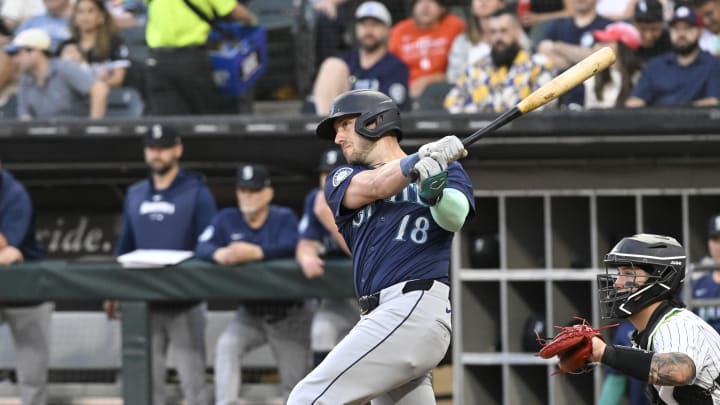 Seattle Mariners designated hitter Mitch Garver (18) hits an RBI double against the Chicago White Sox during the first inning at Guaranteed Rate Field on July 26.