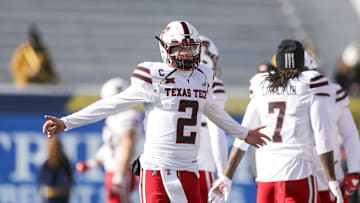Nov 29, 2025; Morgantown, West Virginia, USA; Texas Tech Red Raiders quarterback Behren Morton (2) warms up prior to his game against the West Virginia Mountaineers at Milan Puskar Stadium. Mandatory Credit: Ben Queen-Imagn Images