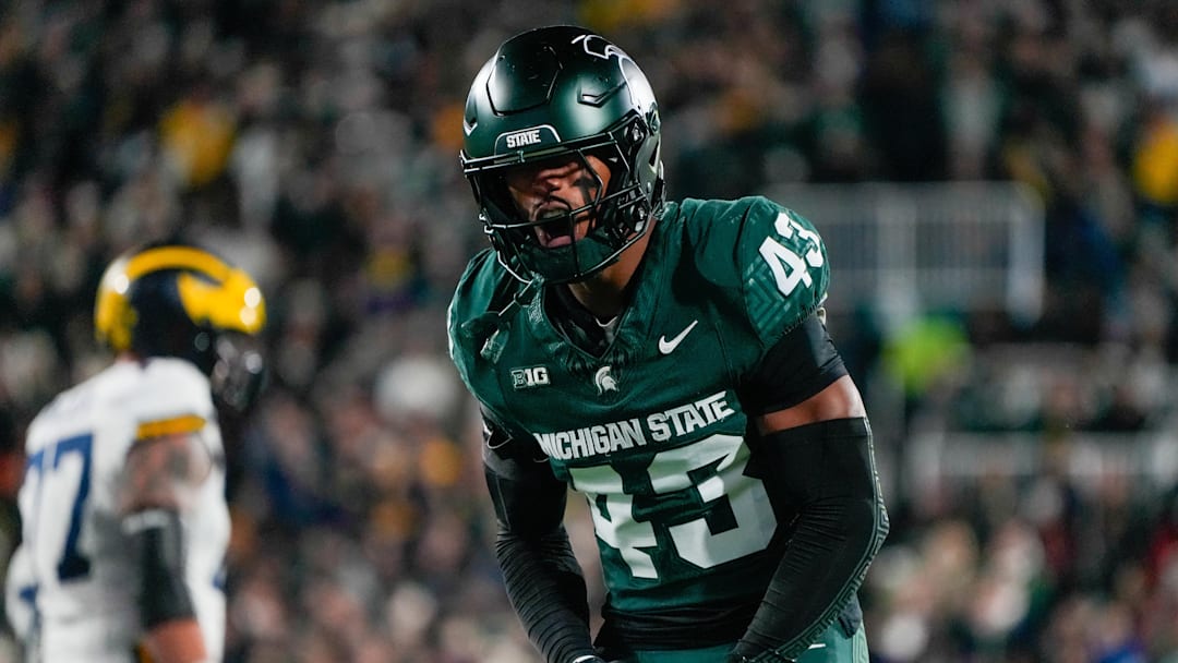 Oct 25, 2025; East Lansing, Michigan, USA; Michigan State Spartans safety Malik Spencer (43) reacts after a third down defensive play against the Michigan Wolverines during the first half at Spartan Stadium. Mandatory Credit: Brendan Mullin-Imagn Images