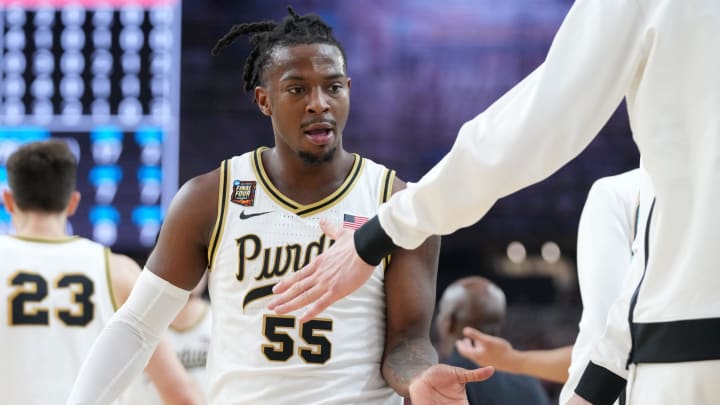 Purdue Boilermakers guard Lance Jones (55) celebrates with teammates.