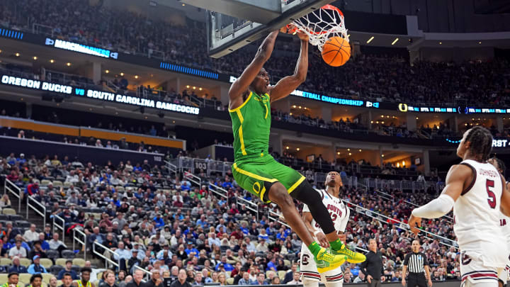 Mar 21, 2024; Pittsburgh, PA, USA; Oregon Ducks center N'Faly Dante (1) dunks the ball against South Carolina Gamecocks guard Meechie Johnson (5) during the second half in the first round of the 2024 NCAA Tournament at PPG Paints Arena. Mandatory Credit: Gregory Fisher-USA TODAY Sports