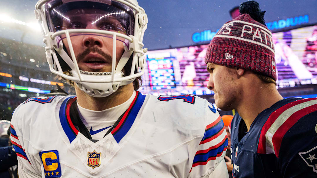 New England Patriots quarterback Drake Maye (10) meets Buffalo Bills quarterback Josh Allen (17) on the field after the game.