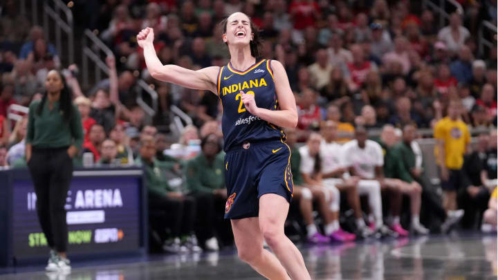 Indiana Fever guard Caitlin Clark (22) reacts as she misses a three-point field goal during the second half of a game against the Seattle Storm on Sunday, Aug. 18, 2024, at Gainbridge Fieldhouse in Indianapolis. The Fever defeated the Storm 92-75.