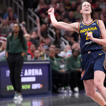 Indiana Fever guard Caitlin Clark (22) reacts as she misses a three-point field goal during the second half of a game against the Seattle Storm on Sunday, Aug. 18, 2024, at Gainbridge Fieldhouse in Indianapolis. The Fever defeated the Storm 92-75.