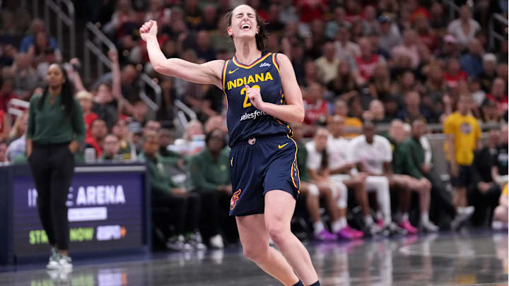 Indiana Fever guard Caitlin Clark (22) reacts as she misses a three-point field goal during the second half of a game against the Seattle Storm on Sunday, Aug. 18, 2024, at Gainbridge Fieldhouse in Indianapolis. The Fever defeated the Storm 92-75.