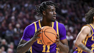 Jan 18, 2025; College Station, Texas, USA; LSU Tigers forward Corey Chest (11) looks to pass the ball during the first half against the Texas A&M Aggies at Reed Arena. The Aggies defeated the Tigers 68-57. Mandatory Credit: Maria Lysaker-Imagn Images 