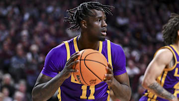 Jan 18, 2025; College Station, Texas, USA; LSU Tigers forward Corey Chest (11) looks to pass the ball during the first half against the Texas A&M Aggies at Reed Arena. The Aggies defeated the Tigers 68-57. Mandatory Credit: Maria Lysaker-Imagn Images 