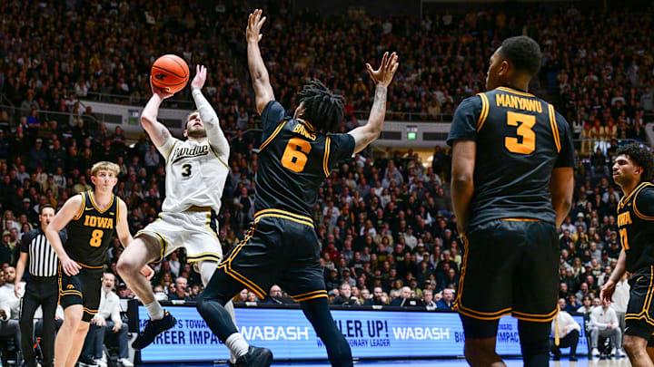 Jan 14, 2026; West Lafayette, Indiana, USA; Purdue Boilermakers guard Braden Smith (3) shoots the ball over Iowa Hawkeyes guard Tavion Banks (6) during the second half at Mackey Arena. Mandatory Credit: Marc Lebryk-Imagn Images