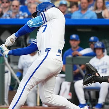 Jul 7, 2025; Kansas City, Missouri, USA; Kansas City Royals shortstop Bobby Witt Jr. (7) hits a two run home run against the Pittsburgh Pirates during the third inning at Kauffman Stadium. Mandatory Credit: Denny Medley-Imagn Images
