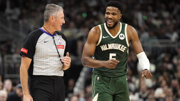 Apr 30, 2024; Milwaukee, Wisconsin, USA;  Milwaukee Bucks guard Malik Beasley (5) talks with referee Scott Foster (48) during the third quarter against the Indiana Pacers during game five of the first round for the 2024 NBA playoffs at Fiserv Forum. Mandatory Credit: Jeff Hanisch-USA TODAY Sports