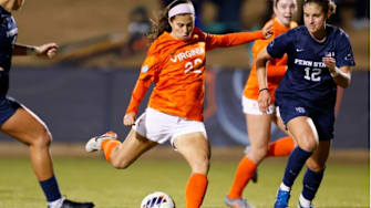 Lia Godfrey drives on goal.