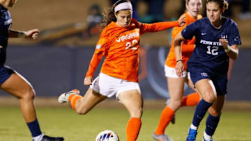 Lia Godfrey drives on goal.