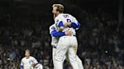 Chicago Cubs outfielder Ian Happ celebrates hitting a walk off single with teammate Pete Crow-Armstrong.