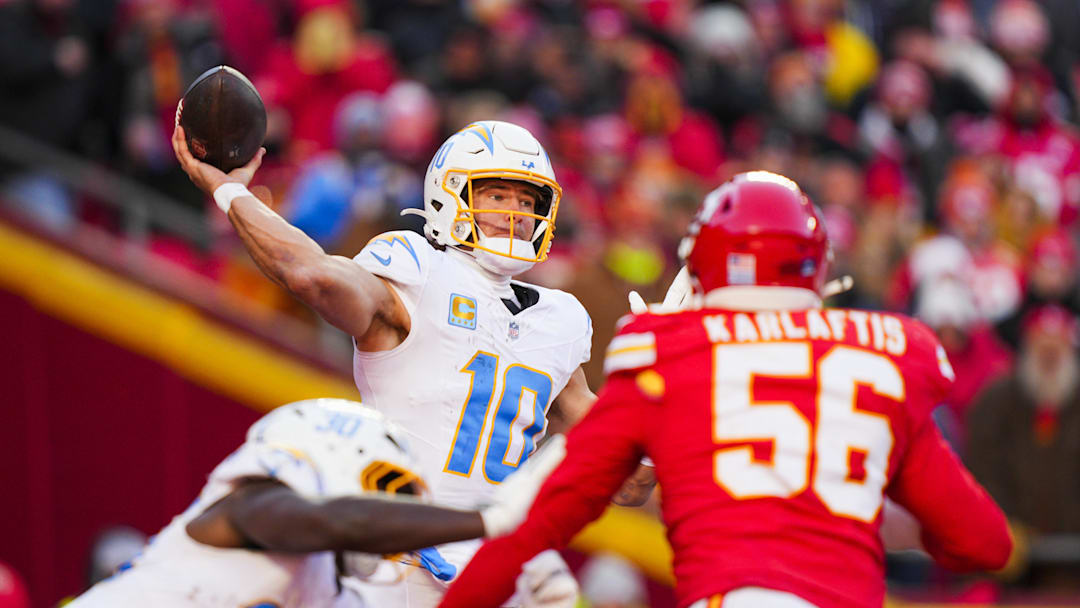 Dec 14, 2025; Kansas City, Missouri, USA; Los Angeles Chargers quarterback Justin Herbert (10) passes against the Kansas City Chiefs during the fourth quarter at GEHA Field at Arrowhead Stadium. Mandatory Credit: Jay Biggerstaff-Imagn Images Dec 14, 2025; Kansas City, Missouri, USA; Los Angeles Chargers quarterback Justin Herbert (10) passes against the Kansas City Chiefs during the fourth quarter at GEHA Field at Arrowhead Stadium. Mandatory Credit: Jay Biggerstaff-Imagn Images