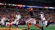 Cincinnati Bengals wide receiver Tee Higgins (5) catches a pass in the end zone for a touchdown in the second quarter of the NFL Week 17 game between the Cincinnati Bengals and the Denver Broncos at Paycor Stadium in downtown Cincinnati on Saturday, Dec. 28, 2024.