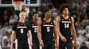 Feb 11, 2025; College Station, Texas, USA; Georgia Bulldogs guard Blue Cain (0), guard Silas Demary Jr. (5) and forward Asa Newell (14) walk on the court during the second half against the Texas A&M Aggies at Reed Arena. Mandatory Credit: Maria Lysaker-Imagn Images 