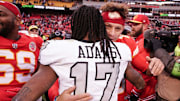 Dec 25, 2023; Kansas City, Missouri, USA; Kansas City Chiefs quarterback Patrick Mahomes (15) embraces Las Vegas Raiders wide receiver Davante Adams (17) after the game at GEHA Field at Arrowhead Stadium. Mandatory Credit: Denny Medley-Imagn Images