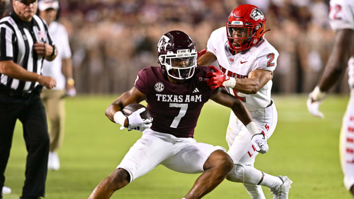 Sep 2, 2023; College Station, Texas, USA; New Mexico Lobos cornerback Zach Morris (2) applies pressure to Texas A&M Aggies wide receiver Moose Muhammad III (7) as he runs the ball during the fourth quarter at Kyle Field. Mandatory Credit: Maria Lysaker-USA TODAY Sports