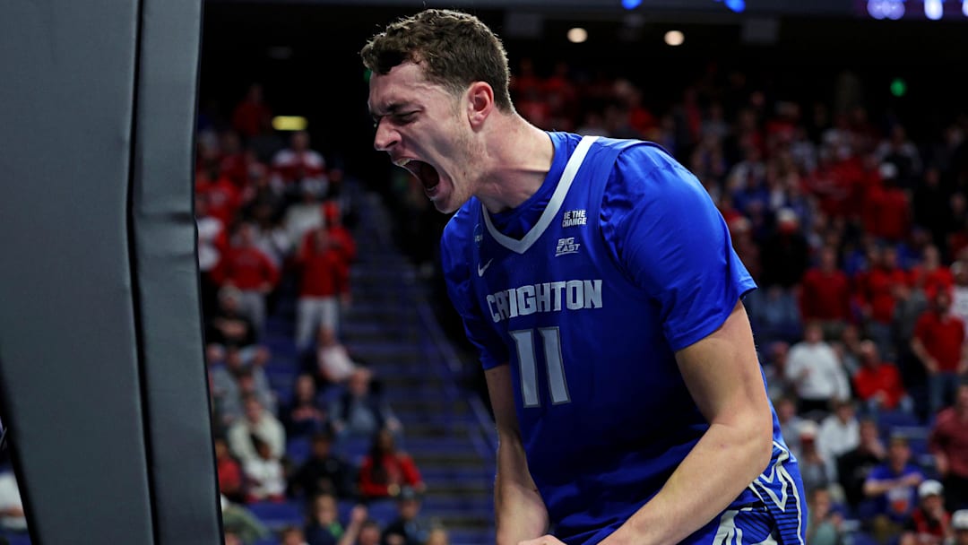 Mar 20, 2025; Lexington, KY, USA; Creighton Bluejays center Ryan Kalkbrenner (11) reacts after a play during the first half against the Louisville Cardinals in the first round of the NCAA Tournament at Rupp Arena. Mandatory Credit: Jordan Prather-Imagn Images