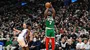 Dec 25, 2024; Boston, Massachusetts, USA; Boston Celtics guard Jaylen Brown (7) shoots the ball against the Philadelphia 76ers during the second half at TD Garden. Mandatory Credit: Eric Canha-Imagn Images