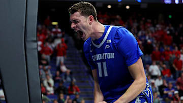 Mar 20, 2025; Lexington, KY, USA; Creighton Bluejays center Ryan Kalkbrenner (11) reacts after a play during the first half against the Louisville Cardinals in the first round of the NCAA Tournament at Rupp Arena. Mandatory Credit: Jordan Prather-Imagn Images