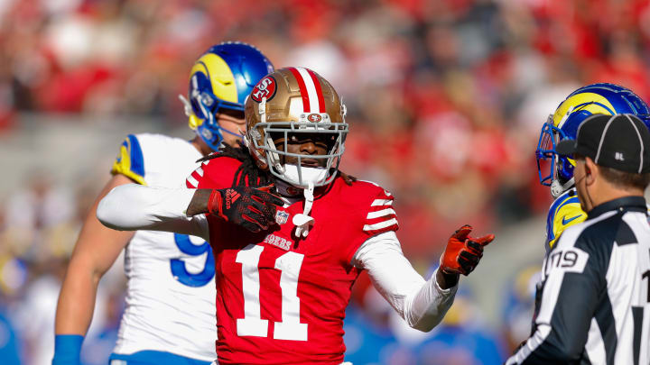 Jan 7, 2024; Santa Clara, California, USA; San Francisco 49ers wide receiver Brandon Aiyuk (11) celebrates after a play against the Los Angeles Rams during the first quarter at Levi's Stadium. Mandatory Credit: Sergio Estrada-USA TODAY Sports