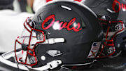 Nov 1, 2024; Boca Raton, Florida, USA;  Florida Atlantic Owls helmets on the bench during the second half against the South Florida Bulls at FAU Stadium. Mandatory Credit: Reinhold Matay-Imagn Images