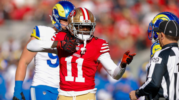 Jan 7, 2024; Santa Clara, California, USA; San Francisco 49ers wide receiver Brandon Aiyuk (11) celebrates after a play against the Los Angeles Rams during the first quarter at Levi's Stadium. 