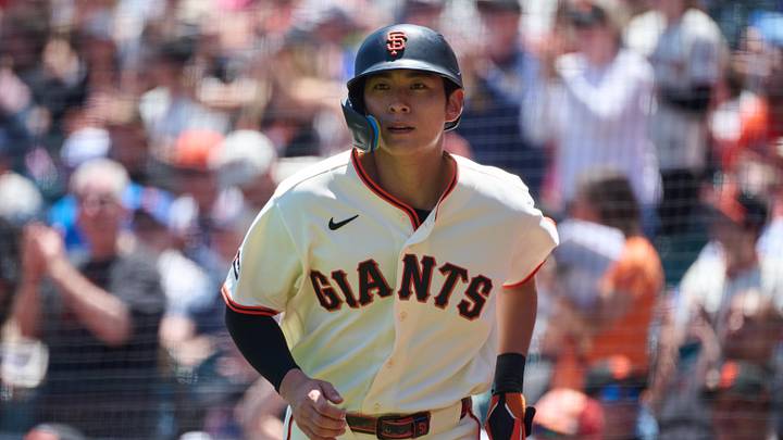 San Francisco, California, USA;  San Francisco Giants outfielder Jung Hoo Lee (51) runs to the dugout after scoring a run against the Chicago Cubs during the fifth inning at Oracle Park. Mandatory Credit: Robert Edwards-Imagn Images