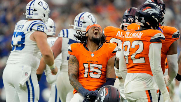 Denver Broncos linebacker Nik Bonitto (15) reacts after a missed field goal by Indianapolis Colts kicker Spencer Shrader.