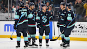 Mar 27, 2025; Seattle, Washington, USA; The Seattle Kraken celebrate after a goal by Seattle Kraken center Jaden Schwartz (17) during the second period against the Edmonton Oilers at Climate Pledge Arena. Mandatory Credit: Steven Bisig-Imagn Images