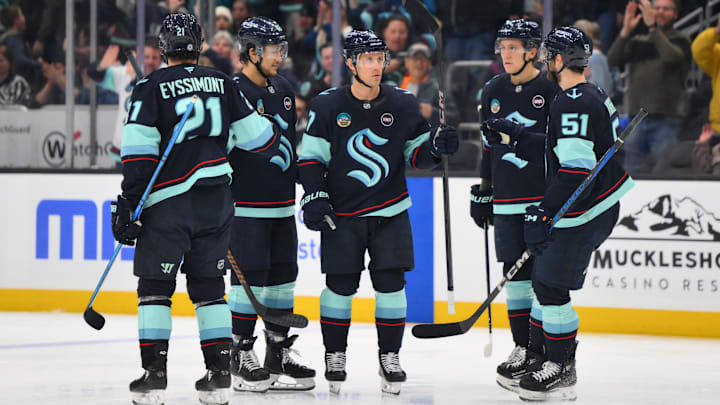 Mar 27, 2025; Seattle, Washington, USA; The Seattle Kraken celebrate after a goal by Seattle Kraken center Jaden Schwartz (17) during the second period against the Edmonton Oilers at Climate Pledge Arena. Mandatory Credit: Steven Bisig-Imagn Images