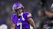 Nov 3, 2024; Minneapolis, Minnesota, USA; Minnesota Vikings cornerback Byron Murphy Jr. (7) celebrates his interception against the Indianapolis Colts in the fourth quarter at U.S. Bank Stadium. Mandatory Credit: Brad Rempel-Imagn Images
