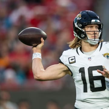 Dec 24, 2023; Tampa, Florida, USA; Jacksonville Jaguars quarterback Trevor Lawrence (16) throws the ball against the Tampa Bay Buccaneers in the second quarter at Raymond James Stadium. Mandatory Credit: Jeremy Reper-USA TODAY Sports