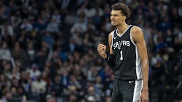 Dec 29, 2024; Minneapolis, Minnesota, USA; San Antonio Spurs center Victor Wembanyama (1) celebrates after making a shot against the Minnesota Timberwolves in the second half at Target Center. Mandatory Credit: Jesse Johnson-Imagn Images