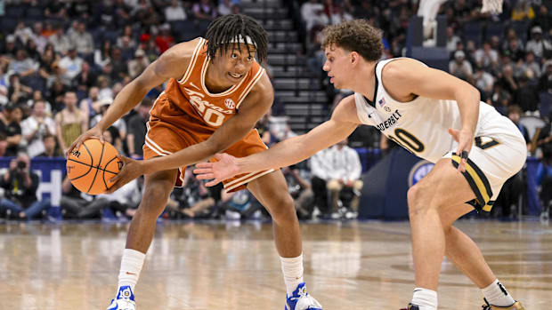 Vanderbilt Commodores guard Chris Manon (30) guards Texas Longhorns guard Tre Johnson (20) during the second half