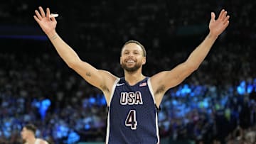 United States shooting guard Stephen Curry (4) celebrates in the second half against France in the men's basketball gold medal game during the Paris 2024 Olympic Summer Games at Accor Arena.