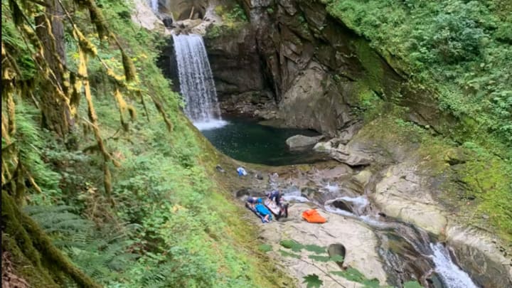 A woman tumbled and fell more than 150 feet down an embankment at Racehorse Falls, Wash., on Tuesday.