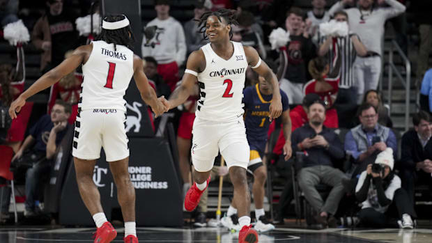 Jizzle James Day Day Thomas Cincinnati men's basketbal