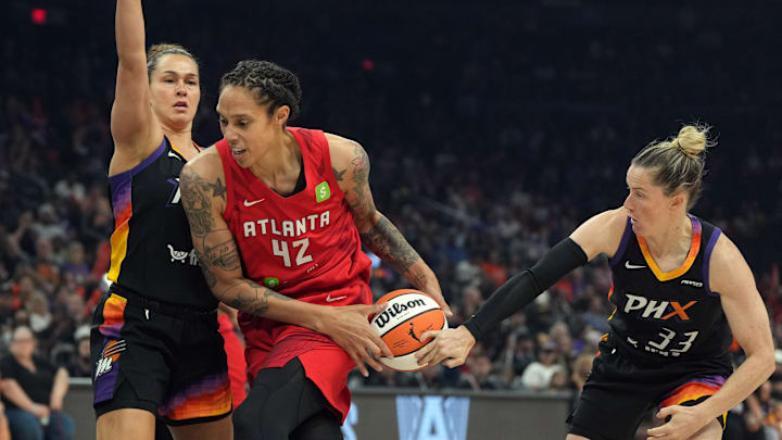 Jul 23, 2025; Phoenix, Arizona, USA; Atlanta Dream center Brittney Griner (42) gets pressured by Phoenix Mercury forward Kathryn Westbeld and guard Sami Whitcomb (33) in the first half at Footprint Center. Mandatory Credit: Rick Scuteri-Imagn Images