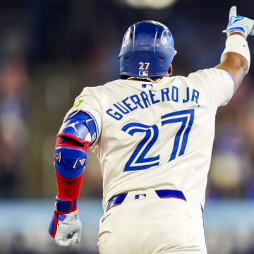 Jun 29, 2024; Toronto, Ontario, CAN; Toronto Blue Jays first base Vladimir Guerrero Jr. (27) celebrates after hitting a home run against the New York Yankees during the first inning at Rogers Centre.