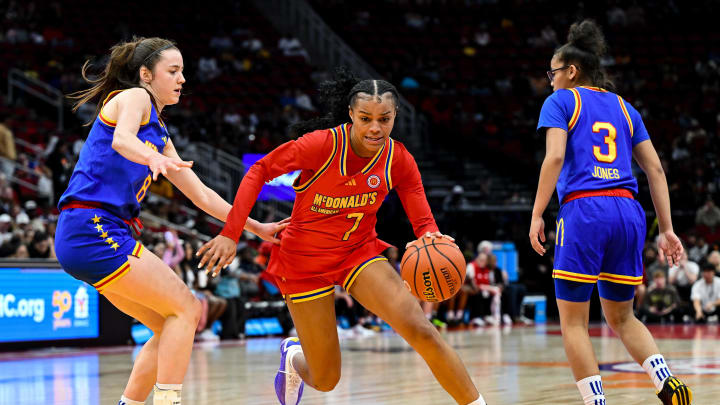 Apr 2, 2024; Houston, TX, USA; McDonald's All American West Jordan Lee (7) drives to the basket as McDonald's All American East Syla Swords (8) defends during the second half at Toyota Center. Mandatory Credit: Maria Lysaker-USA TODAY Sports