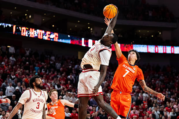 Nebraska Cornhuskers forward Juwan Gary (4) gets a rebound against Illinois Fighting Illini forward Will Riley (7).