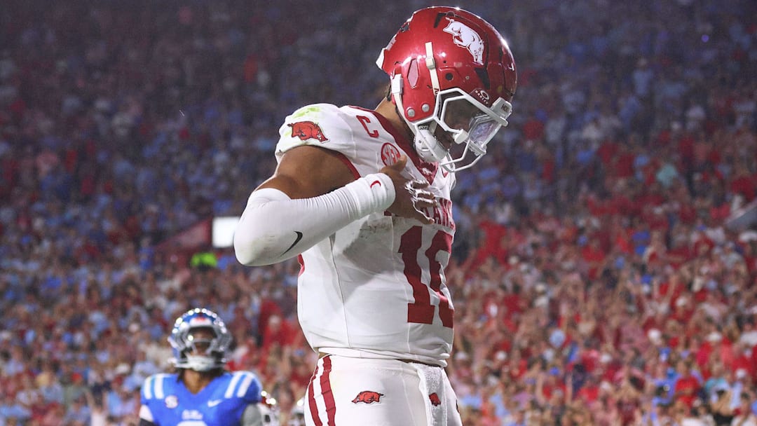 Sep 13, 2025; Oxford, Mississippi, USA; Arkansas Razorback quarterback Taylen Green (10) reacts after running for a touchdown during the second quarter against the Mississippi Rebels at Vaught-Hemingway Stadium. Mandatory Credit: Petre Thomas-Imagn Images