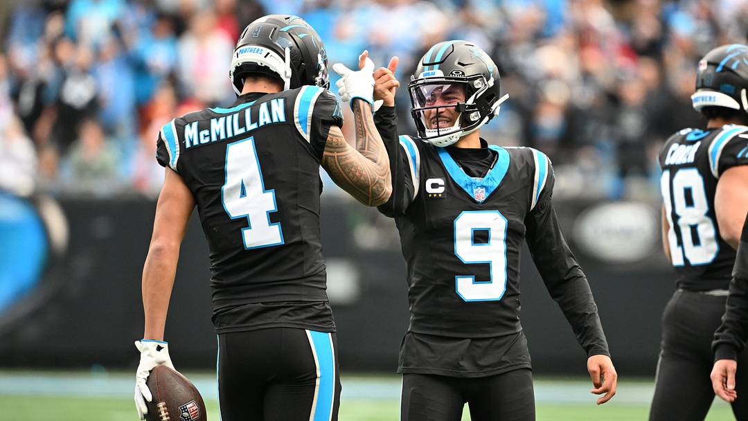  Carolina Panthers wide receiver Tetairoa McMillan (4) celebrates with quarterback Bryce Young 