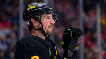 Jan 25, 2025; Vancouver, British Columbia, CAN; Vancouver Canucks forward J.T. Miller (9) during a stop in play against the Washington Capitals in the first period at Rogers Arena. Mandatory Credit: Bob Frid-Imagn Images