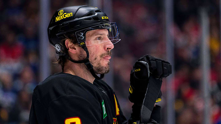 Jan 25, 2025; Vancouver, British Columbia, CAN; Vancouver Canucks forward J.T. Miller (9) during a stop in play against the Washington Capitals in the first period at Rogers Arena. Mandatory Credit: Bob Frid-Imagn Images